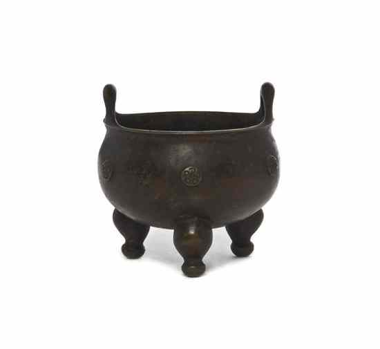 Appraisal: A Chinese Bronze Tripod Censer of circular form with raised