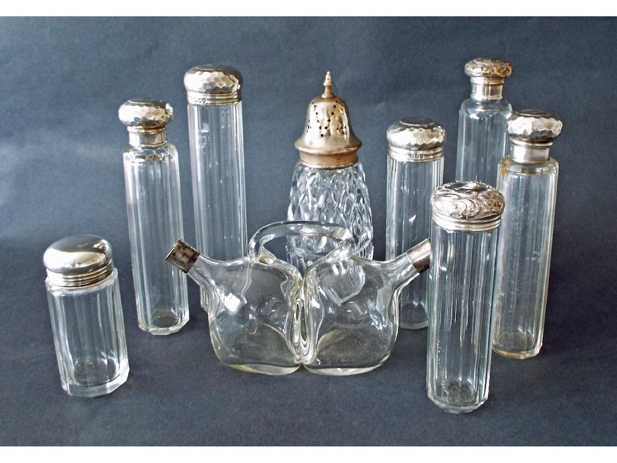 Appraisal: Collection of glass and silver scent and dressing bottles to