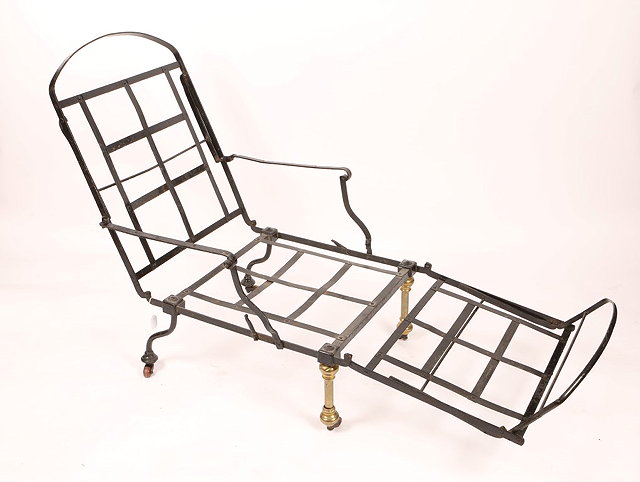 Appraisal: A VICTORIAN BLACK PAINTED AND BRASS FOLDING CAMPAIGN BED cum