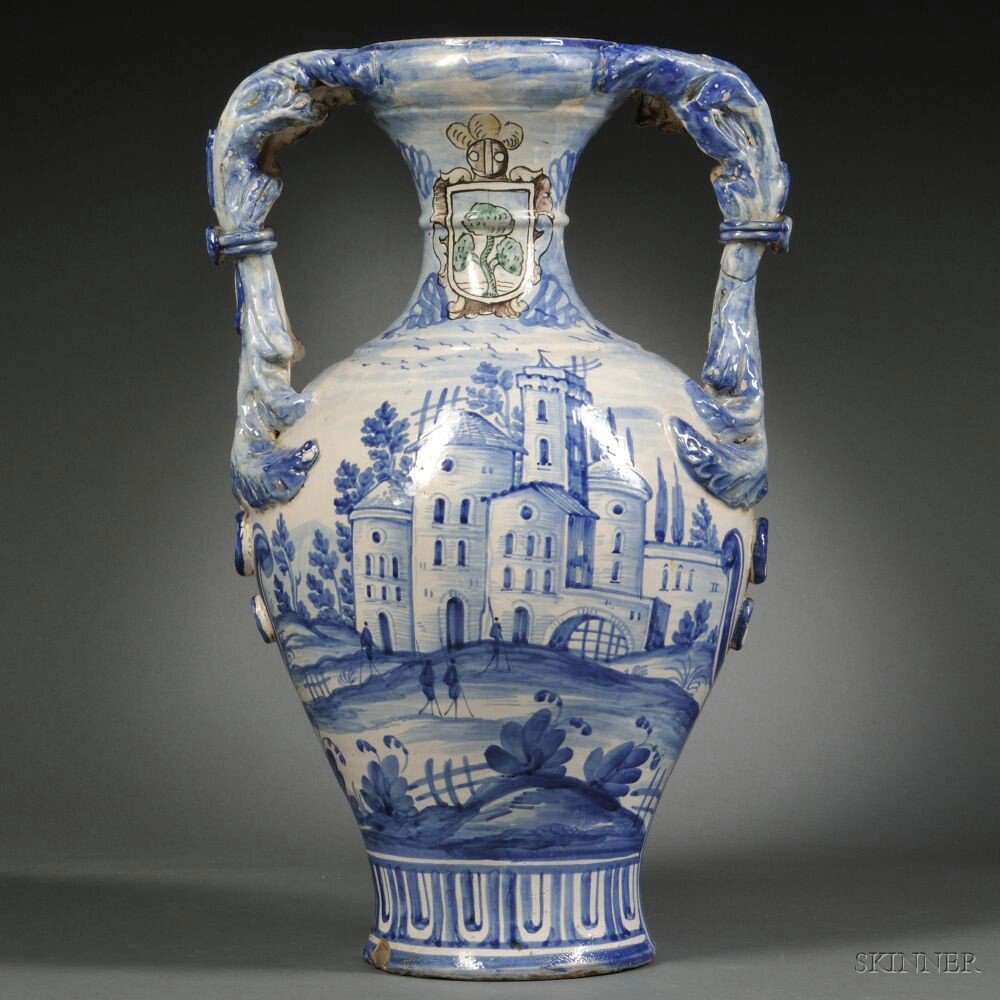 Appraisal: Glazed Earthenware Two-handled Urn Continental th century foliate molded handles