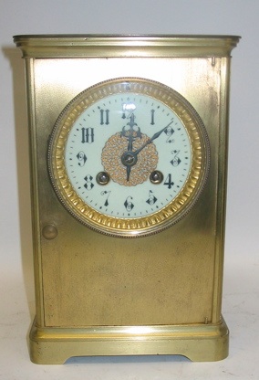 Appraisal: A GILT METAL CASED MANTEL CLOCK time and strike with