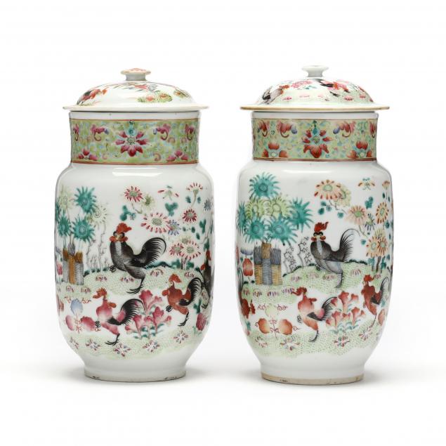 Appraisal: A PAIR OF CHINESE PORCELAIN COVERED JARS WITH ROOSTERS Early