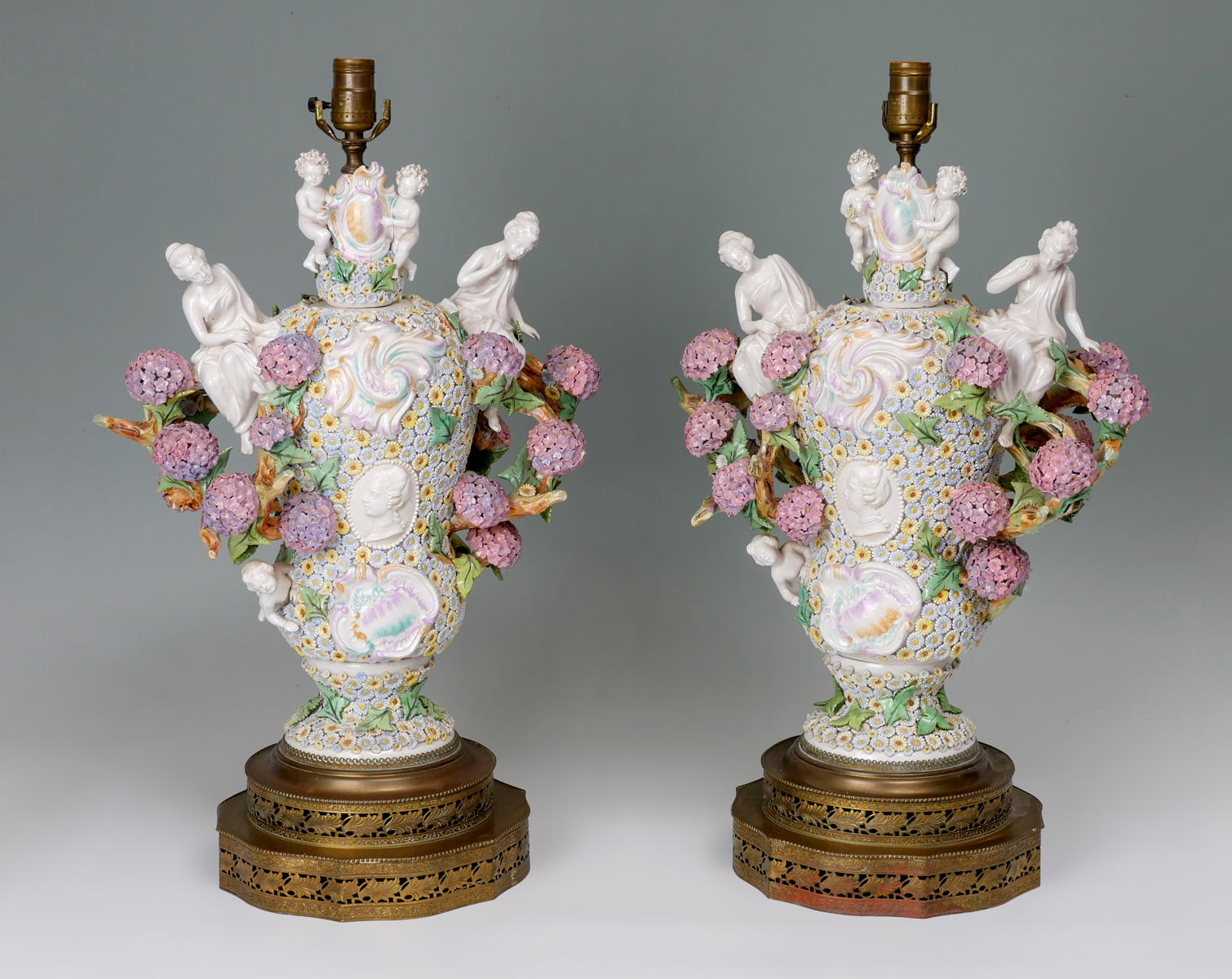 Appraisal: PR OF PORCELAIN FLORAL DECORATED LAMPS floral decorated lamps having