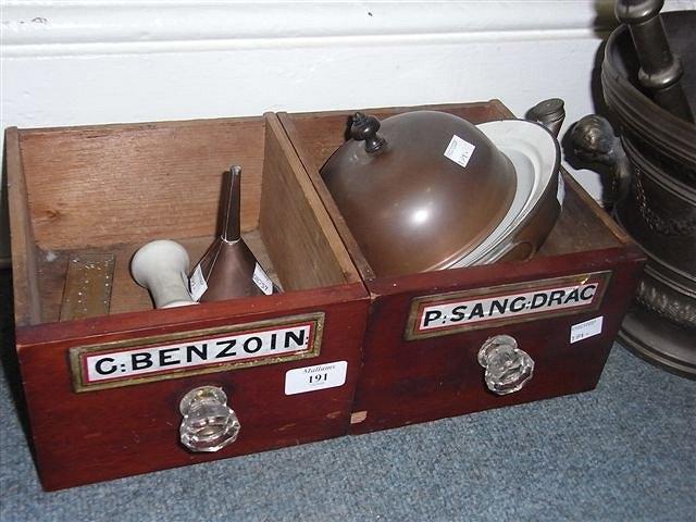 Appraisal: TWO CHEMISTS DRAWERS with old labels a copper funnel and