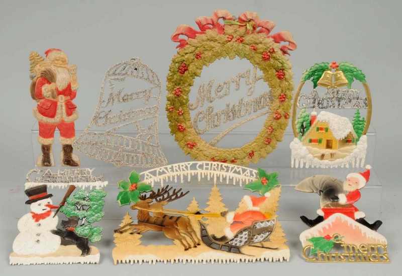 Appraisal: Lot of Pressed Cardboard Christmas Hangings Description German Includes three