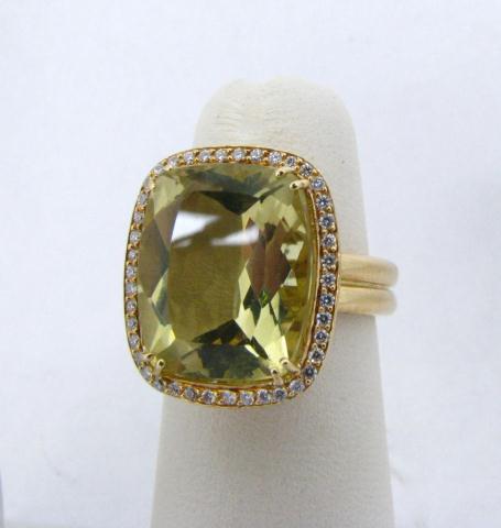 Appraisal: k yellow gold oval lemon citrine ring with white diamond