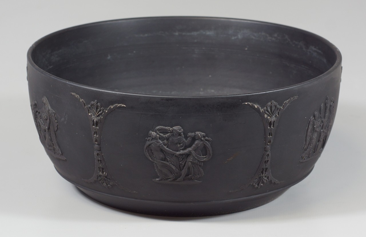 Appraisal: Wedgwood black jasper bowl with classical relief design around outside