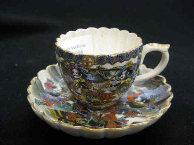 Appraisal: Japanese Satsuma Pottery Cup Saucer finely detailed scenes of Samurai