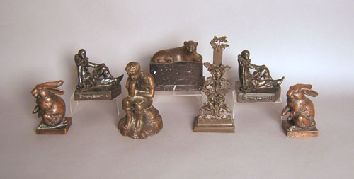 Appraisal: Seven cast bookends and doorstops tallest - h