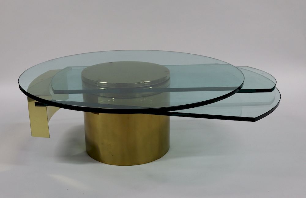 Appraisal: Dakota Jackson Self Winding Coffee Table Coffee table has three