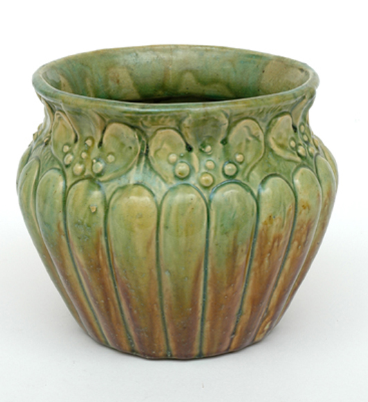 Appraisal: VICTORIA ART POTTERY Circa Relief moulded earthenware jardiniere with a