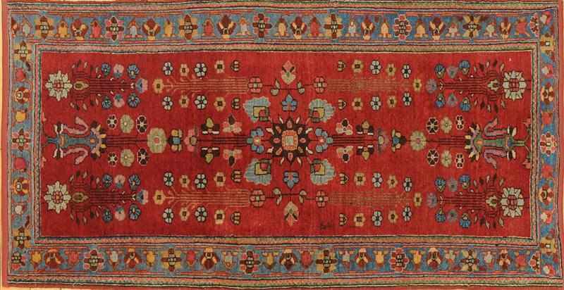 Appraisal: PERSIAN ROSE-GROUND RUG Worked with floral stems within light blue