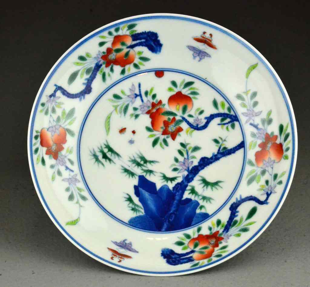 Appraisal: A Rare Chinese Doucai Butterfly And Peach BowlThe interior finely