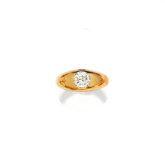 Appraisal: DIAMOND GENTLEMAN'S RING ca Yellow gold g Casual solid band