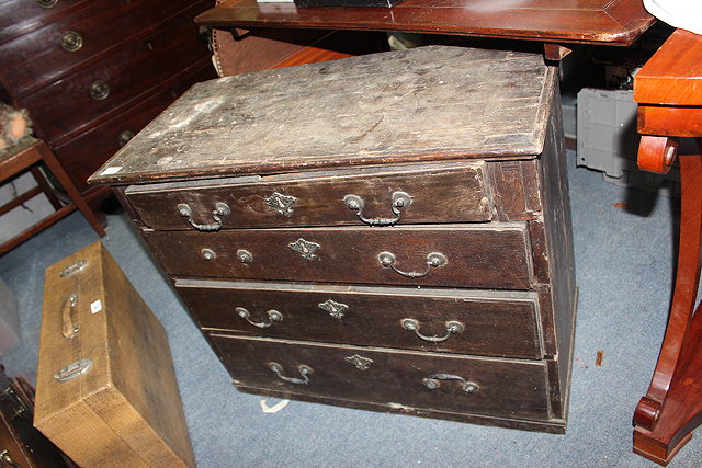 Appraisal: A GEORGIAN OAK BACHELORS CHEST of four long drawers for