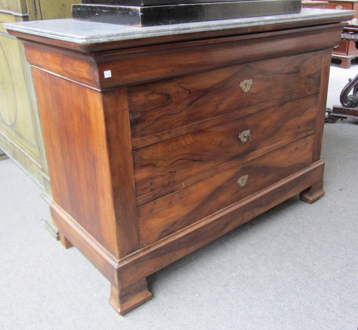 Appraisal: An early th century French marble top commode with four