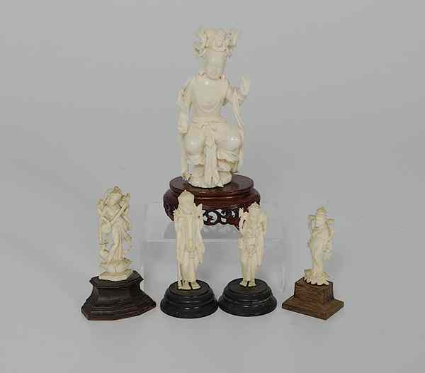 Appraisal: Indian Carved Ivory Deity Plus India A carved ivory deity