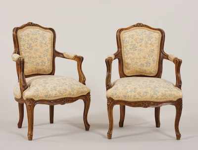 Appraisal: A Pair of French Style Child's Chairs The frames carved