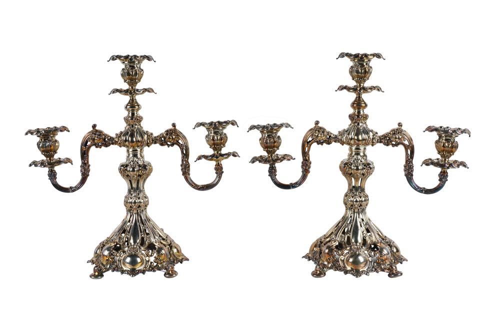 Appraisal: PAIR OF SILVERPLATE THREE-LIGHT CANDELABRAeach marked for Reed and Barton