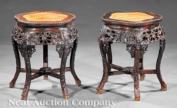 Appraisal: A Pair of Chinese Carved Hardwood Plant Stands inset marble