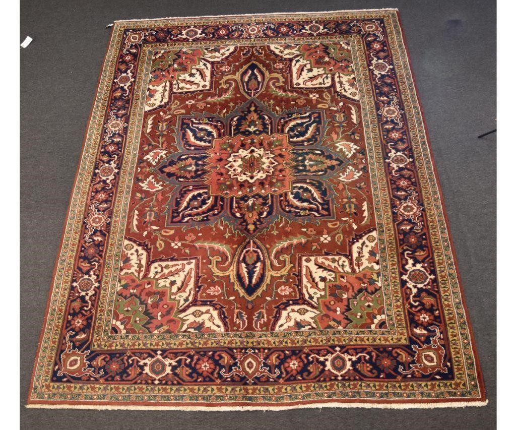 Appraisal: Bright room size Heriz carpet th c with center medallion