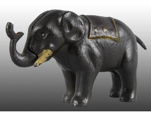 Appraisal: Cast Iron Elephant Mechanical Bank Description Depress tail and trunk