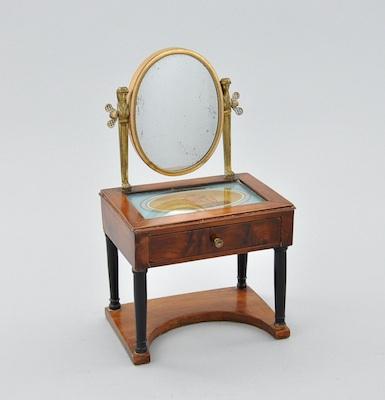 Appraisal: A Miniature Empire Dressing Table With the body in walnut