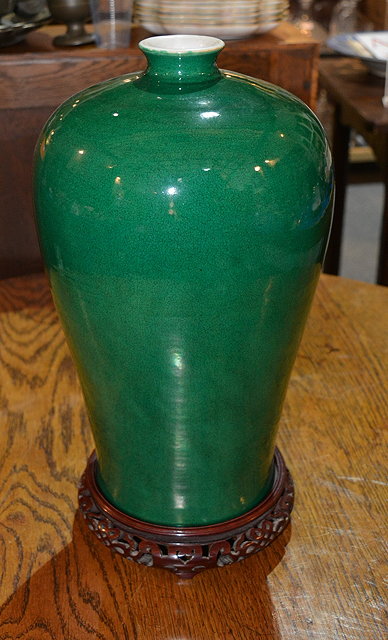 Appraisal: A Chinese green porcelain Meiping vase th Centurywith hardwood stand