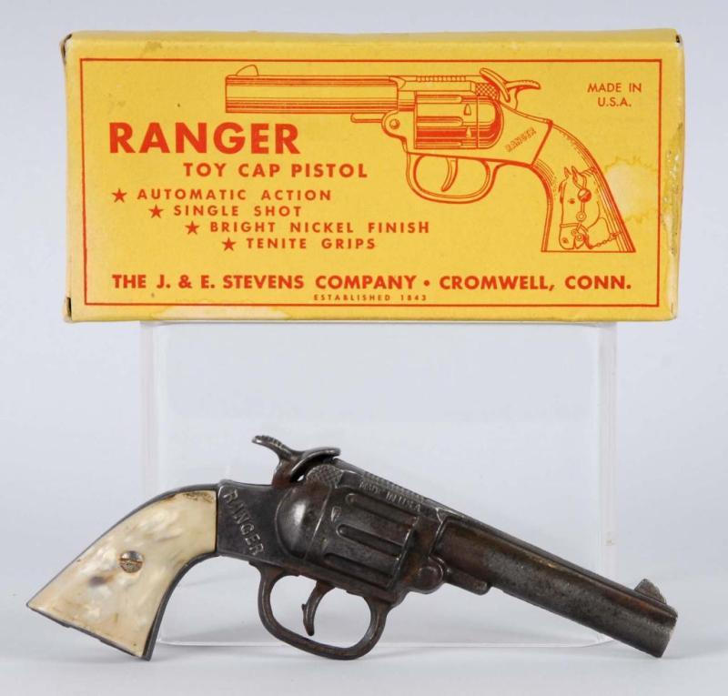 Appraisal: Cast Iron Ranger Cap Gun Description Grips are warped stained