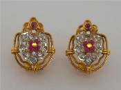 Appraisal: A pair of ruby earrings set to the centre with