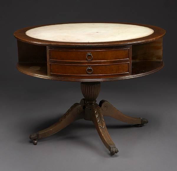 Appraisal: A George III style leather mounted mahogany drum table second