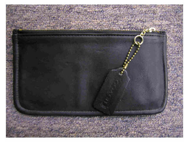 Appraisal: Coack black leather zipper closure document wallet