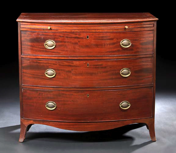 Appraisal: Regency Mahogany Bowfront Chest early th century the banded and