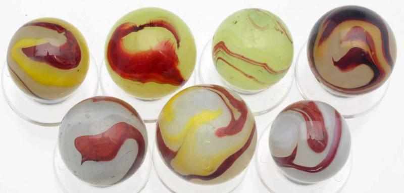 Appraisal: Lot of Akro Agate Oxblood Marbles This lot includes two