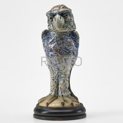 Appraisal: MARTIN BROTHERS Small bird tobacco jar England Salt-glazed stoneware enameled