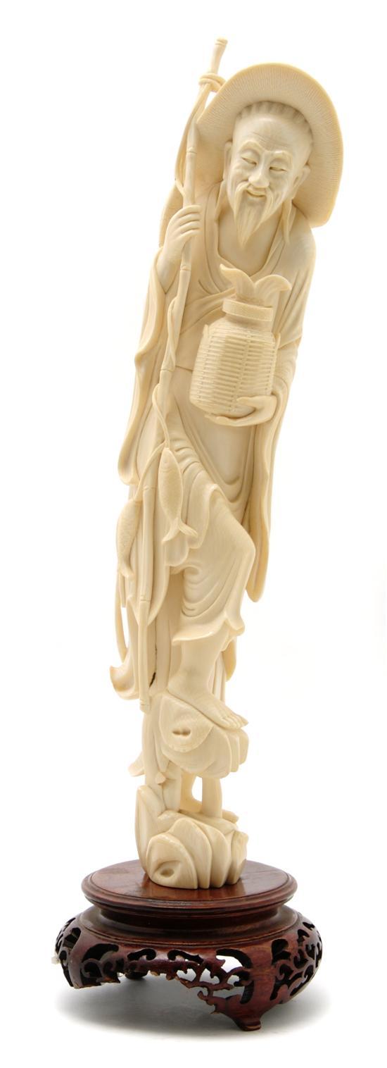 Appraisal: Chinese Ivory Carving of a Fisherman the man depicted holding