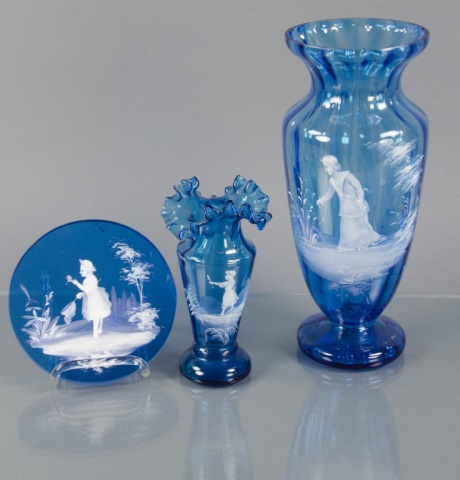 Appraisal: Three Pieces Mary Gregory Blue Glass ItemsIncluding one tall vase