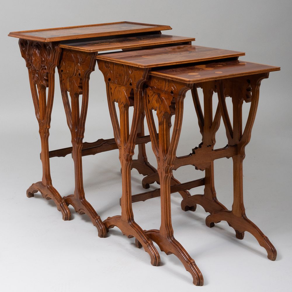 Appraisal: mile Gall Mahogany and Statinwood Marquetry Nest of Four Tables