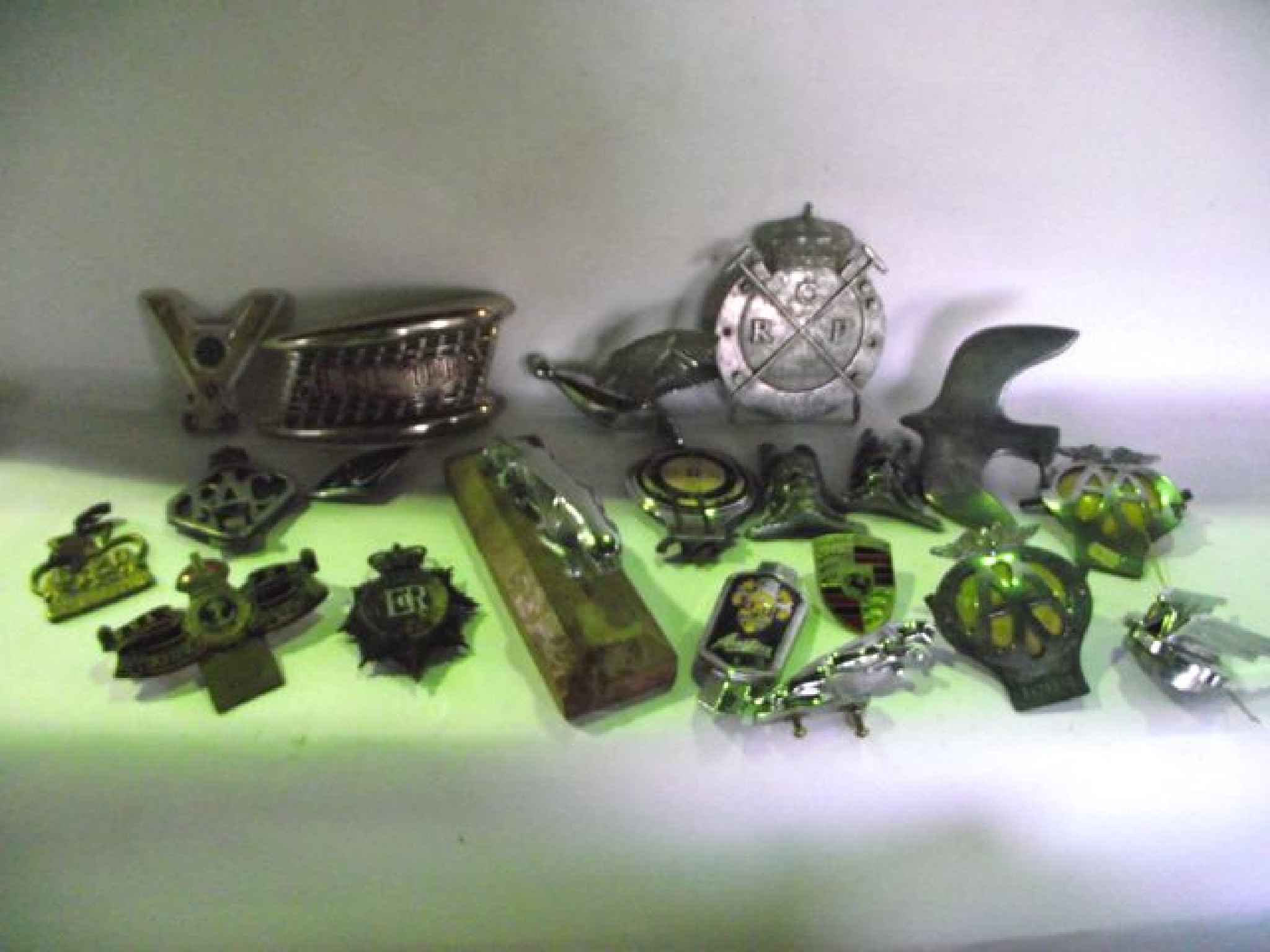 Appraisal: A selection of vintage car hood ornaments and badges etc