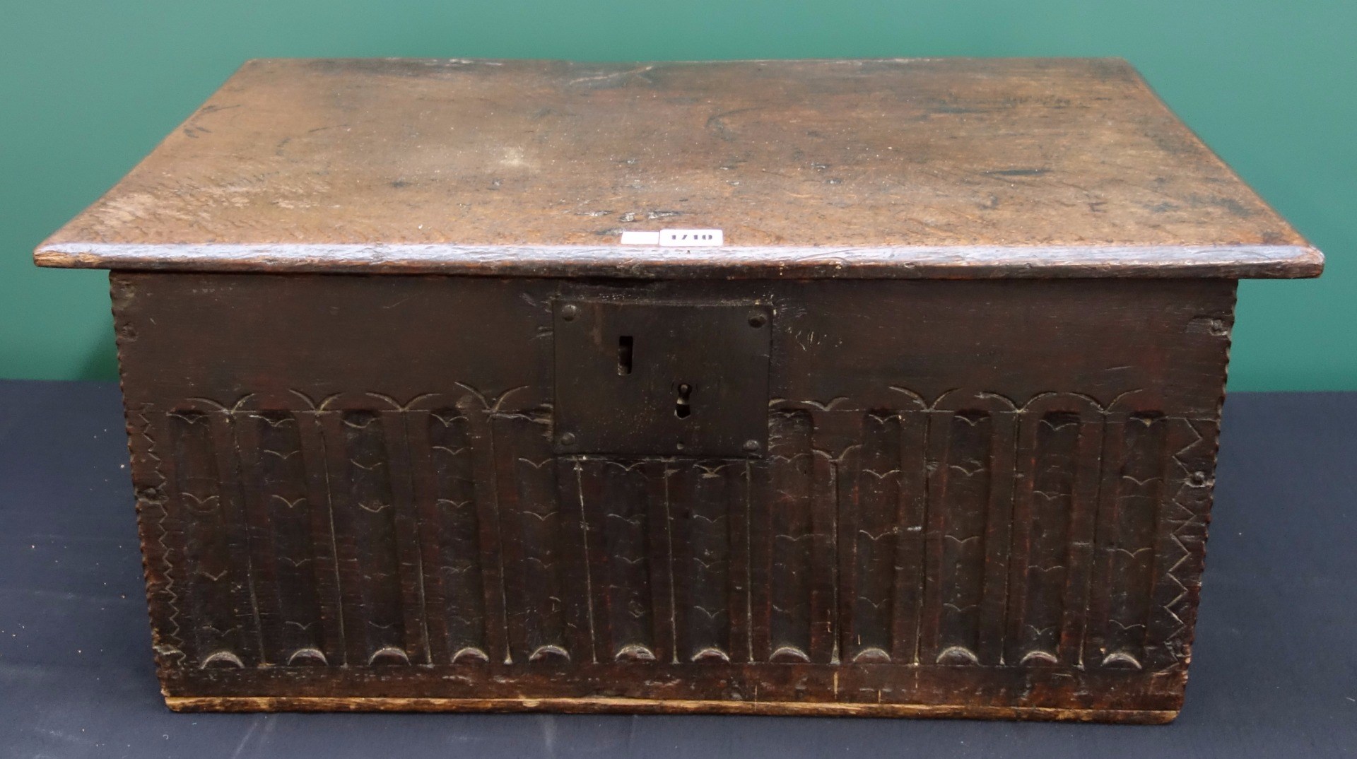 Appraisal: A th century oak bible box with carved front panel