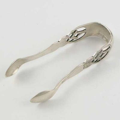 Appraisal: A pair of modern Masonic sugar tongs pierced with a