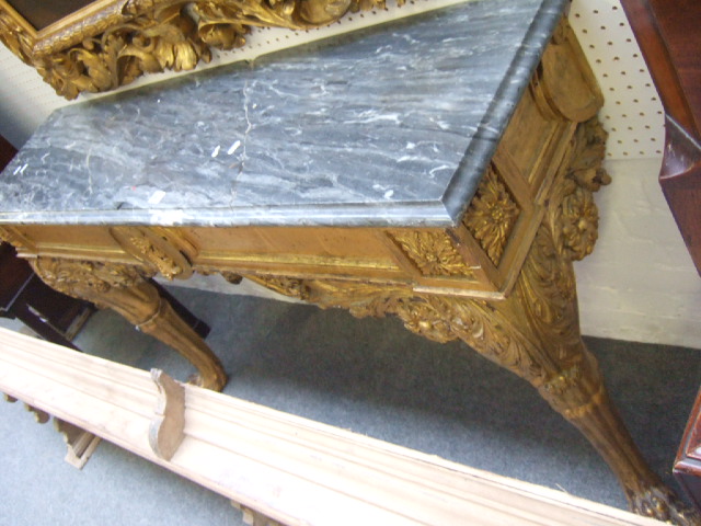 Appraisal: A mid Victorian console table the rectangular top over a