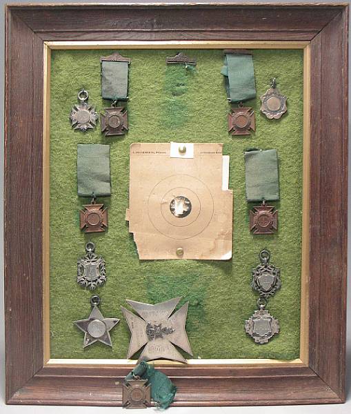 Appraisal: A group of British shooting medals Mounted on green wool