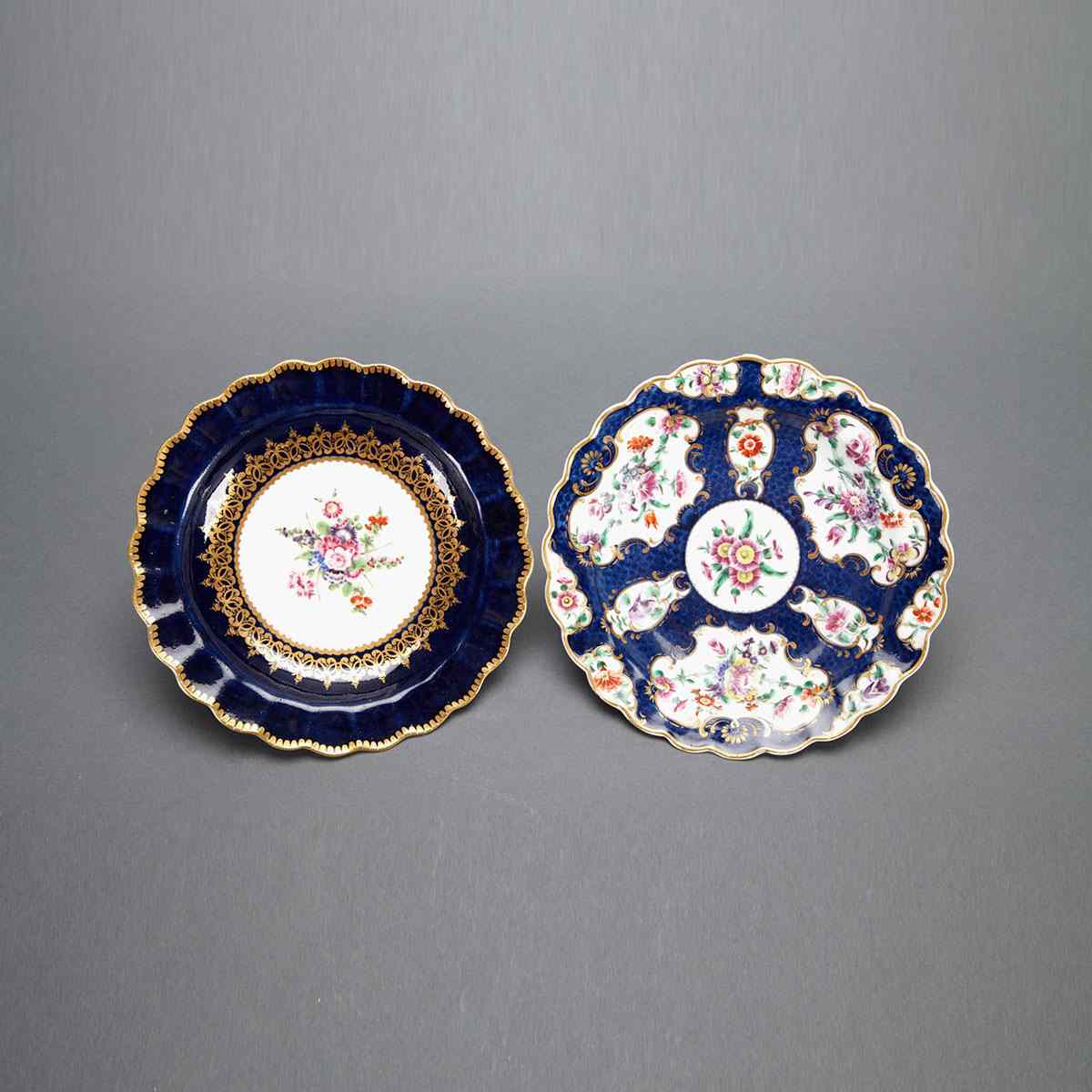 Appraisal: Two Worcester Blue Ground Plates c enameled with flowers diameter