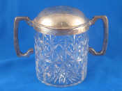 Appraisal: A silver mounted two handled cut glass biscuit barrel with