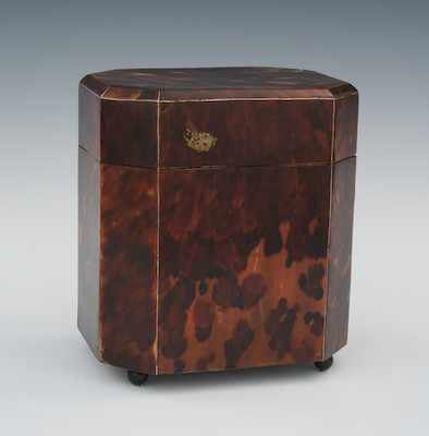 Appraisal: A Tortoise Clad Tea Caddy The canted corner rectangular box