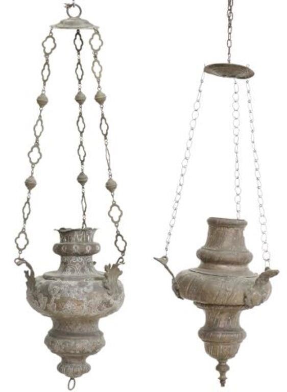 Appraisal: CONTINENTAL HANGING -LIGHT SANCTUARY LAMPS pair Continental patinated metal hanging