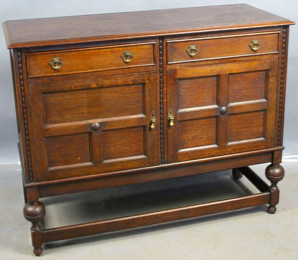 Appraisal: Wallace Nutting-style Jacobean oak cabinet x x EST