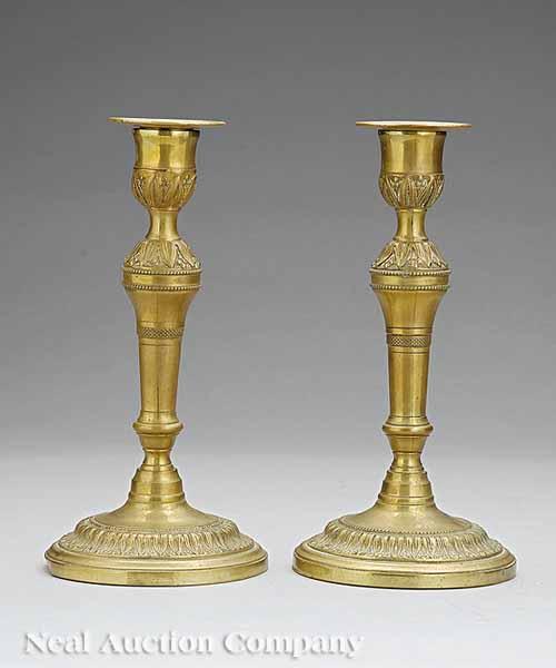 Appraisal: A Pair of Antique French Brass Candlesticks th c removable