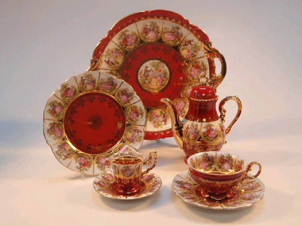 Appraisal: A Continental bone china tea and coffee service decorated in